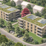 Ansicht zwei Gebäude mit viel grün drumherum, Straße, Stellplätze